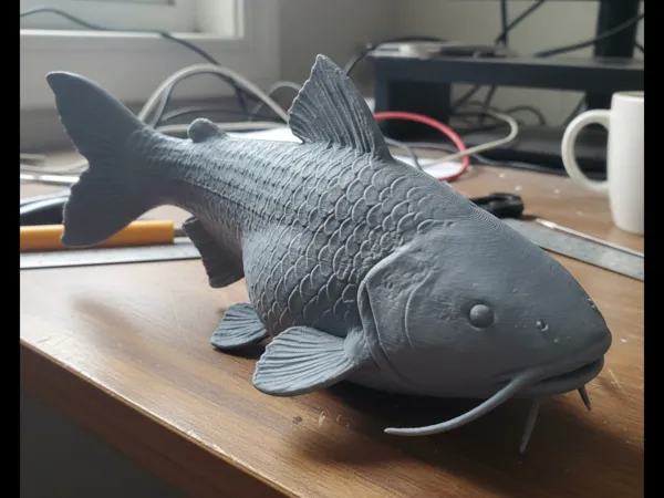 Statue de poisson-chat