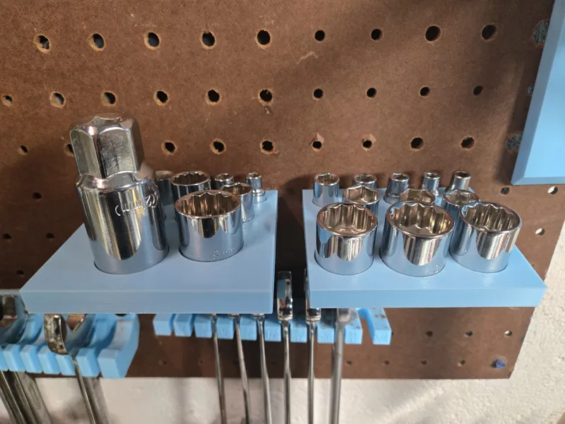 Metric and Imperial socket wrench for pegboard