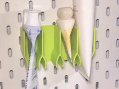 Pegboard Toothpaste and Facial Cleanser Holder