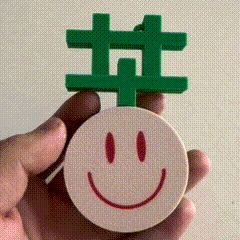 “苦草”笑脸创意变形字包挂