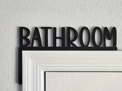 Scritta Bathroom sopra la porta