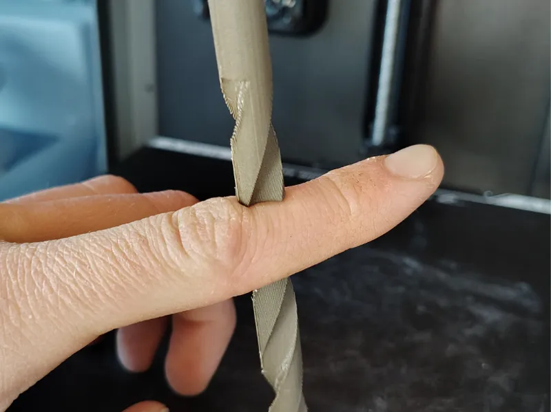 Drill bit through finger 