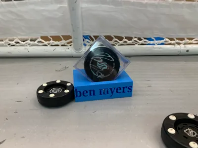 puck stand for case