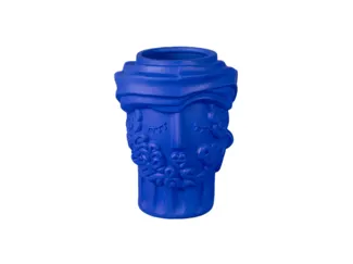 Blue ceramic vase with face and floral
