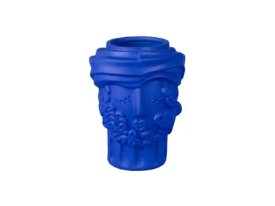 Blue ceramic vase with face and floral