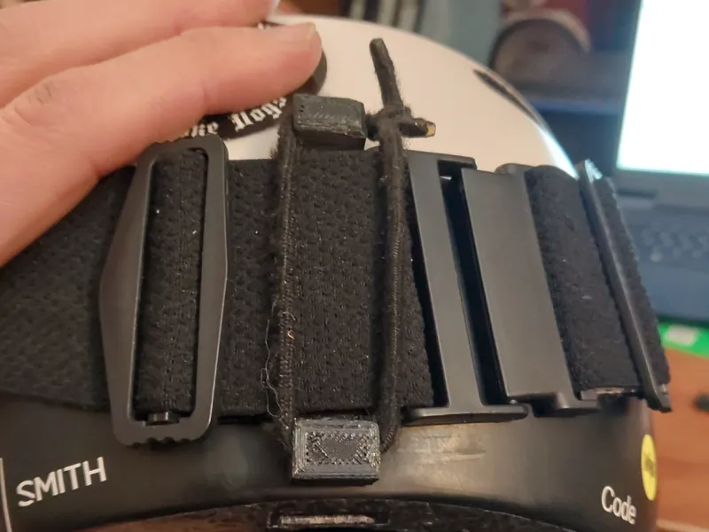 universal stick on goggle clip 
