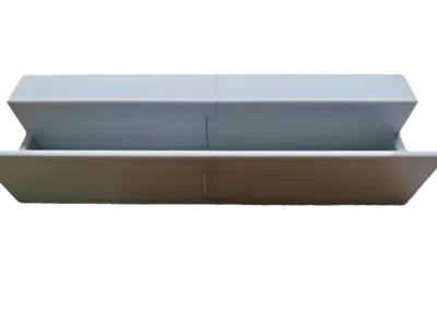 Laptop power brick holder behind desk
