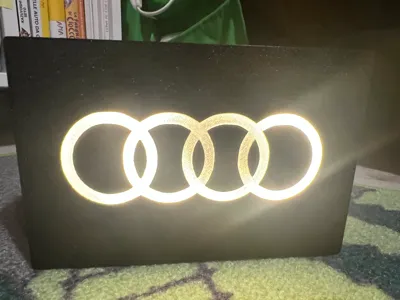 small lamp with Audi logo