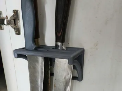Knife rack mounted on the cabinet door
