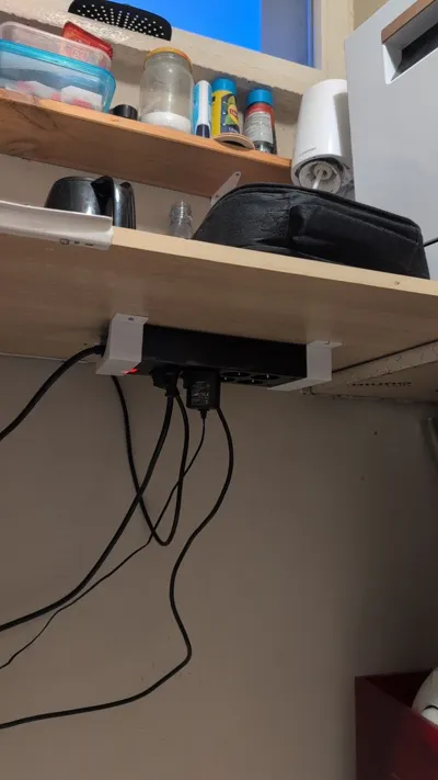 Under table mount for 10.4cm width power strip