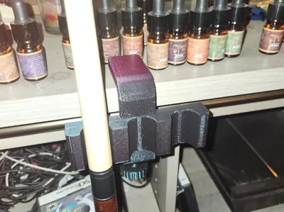 Pool cue holder table clamp