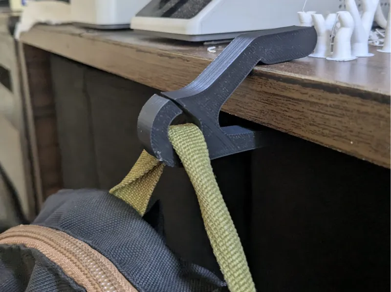 Backpack shelf/tabletop holder (thin grab handles)