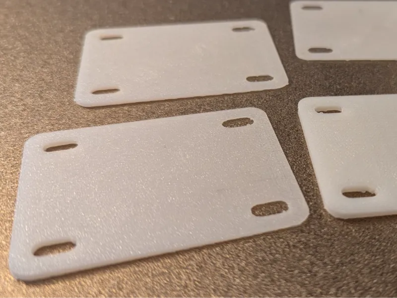 Neck shim for bolt-on guitar/bass necks