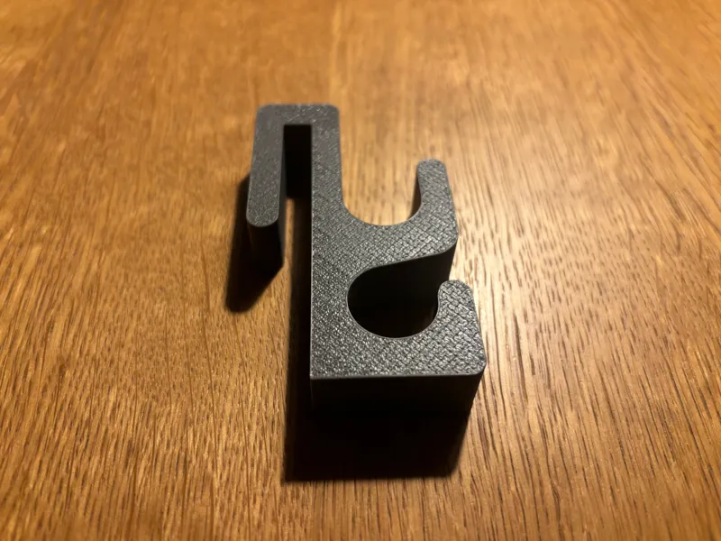 Bathroom hook mounted on shower glass