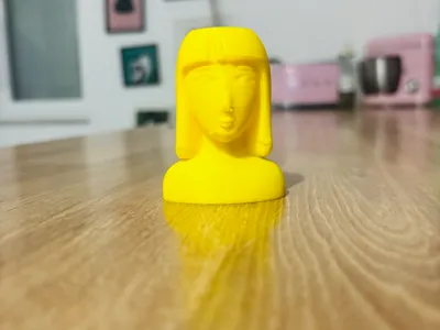 Woman's face vase