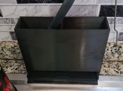 Sink cutlery drainer.