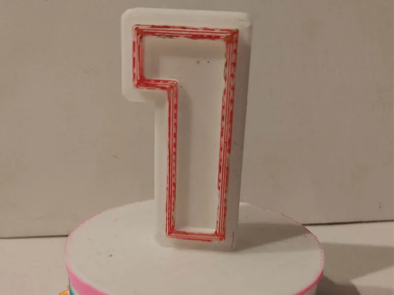 A cake for a number for a candle for birthday