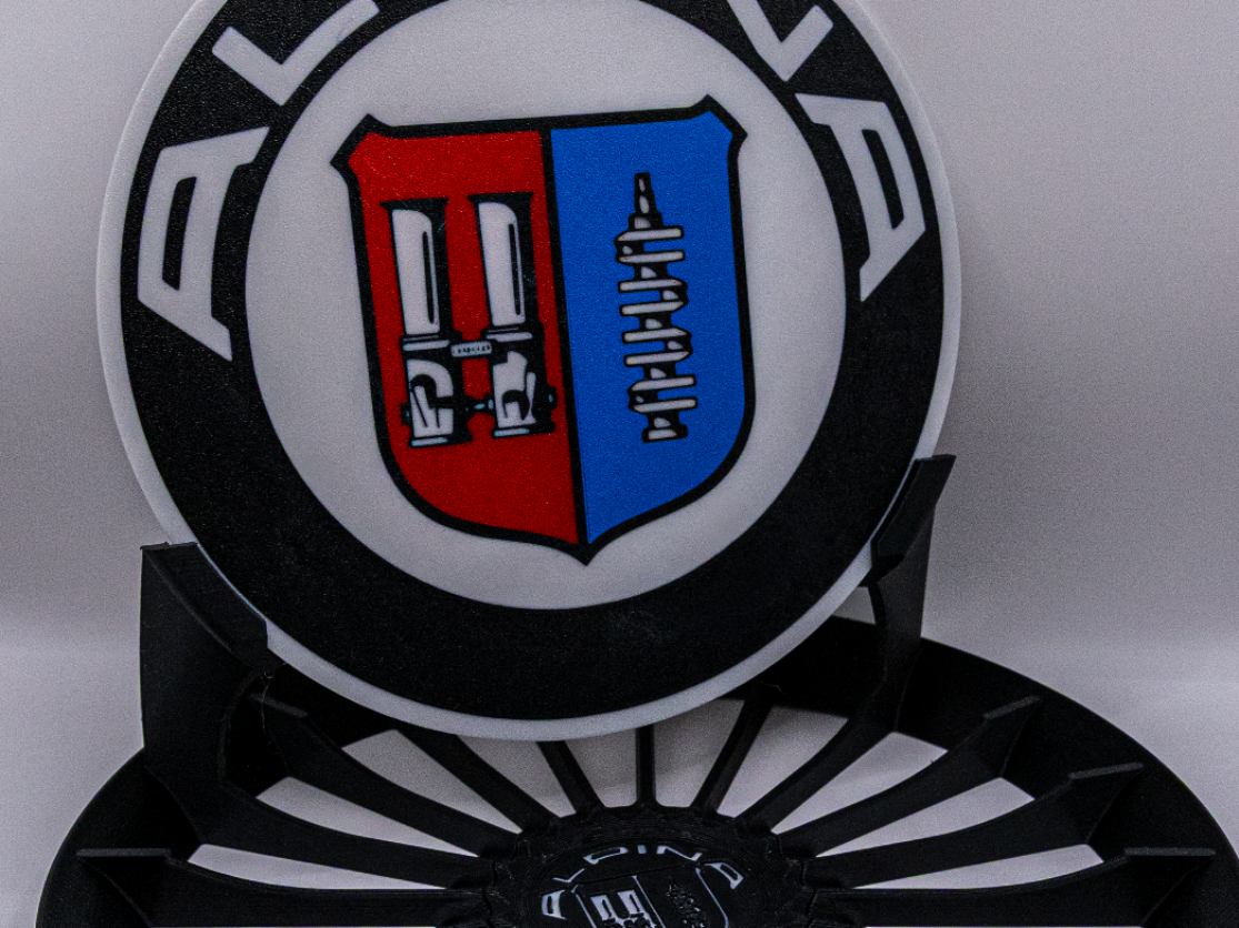 Alpina Deko Emblem mit Felgenständer 