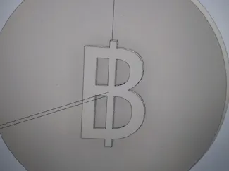 smal Bitcoin with a diameter of 2,5 cm