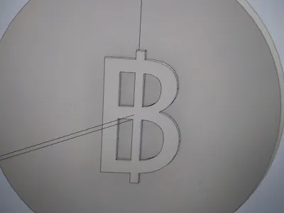 smal Bitcoin with a diameter of 2,5 cm