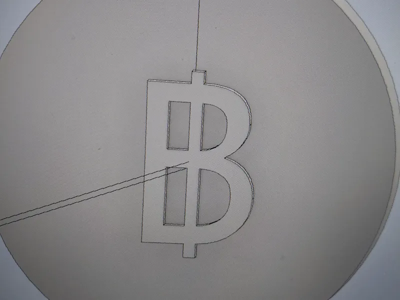 smal Bitcoin with a diameter of 2,5 cm