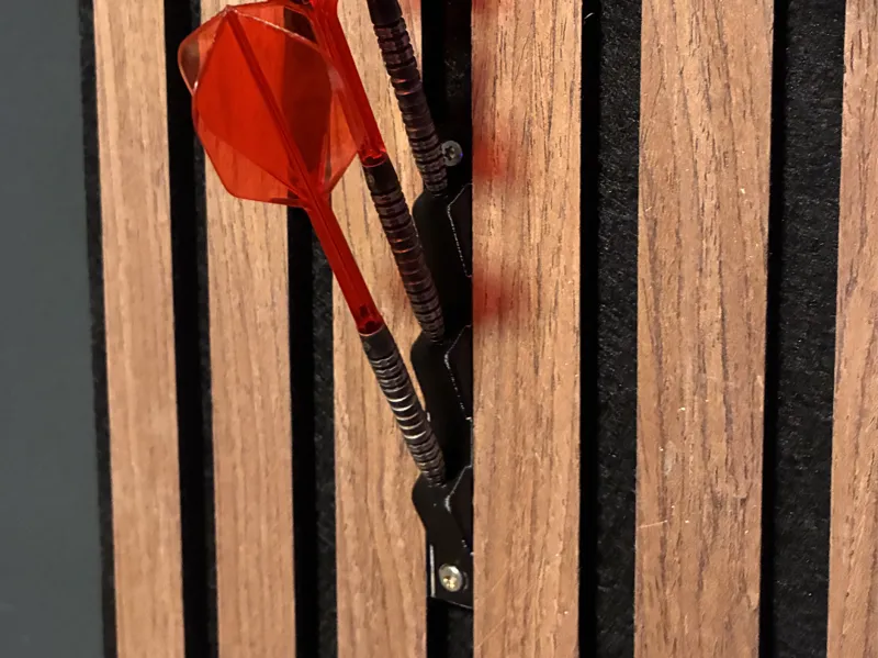 Parametric dart holder for acoustic wall panel 