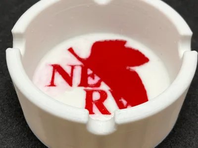Round ashtray with NERV logo