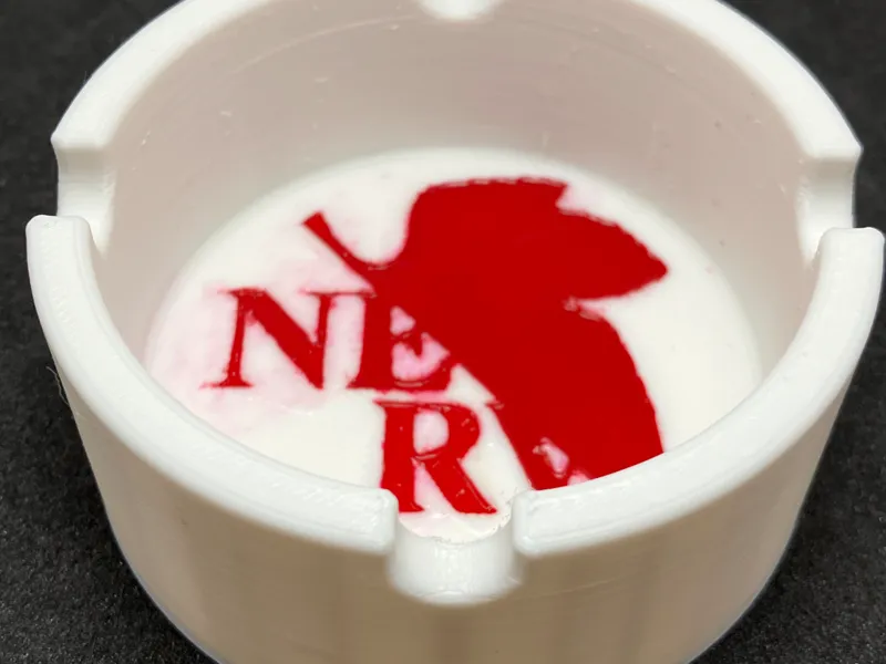 Round ashtray with NERV logo