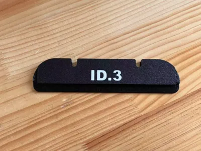 Volkswagen ID.3 charging cable baffle with logo