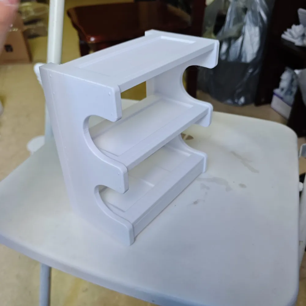 Elevated scalable up scalable down multi-tiered storage storage rack ...