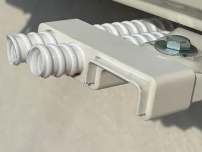 Air conditioner condensation hose holder