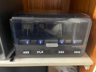 Magnetic material tags for AMS