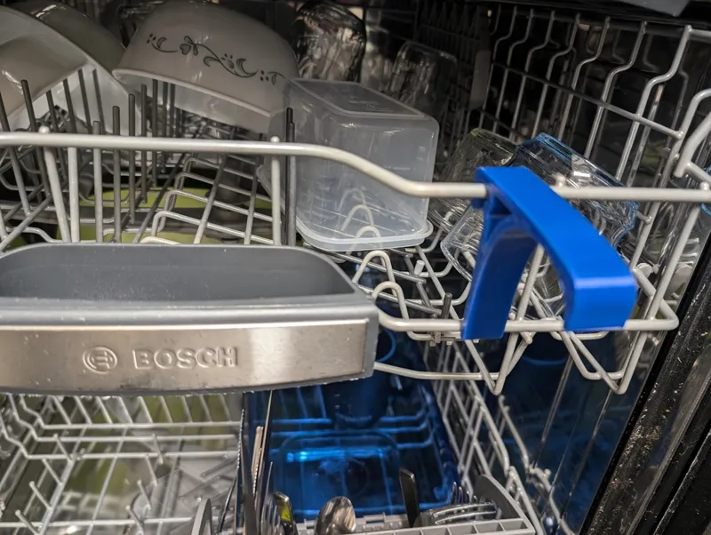 Dishwasher door prop