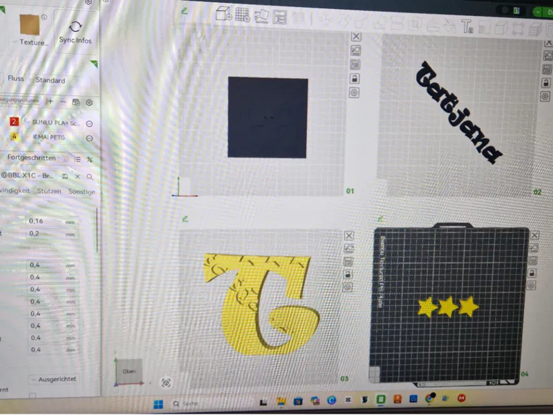 Buchstabe mit in der Basis eingraviertem Namen