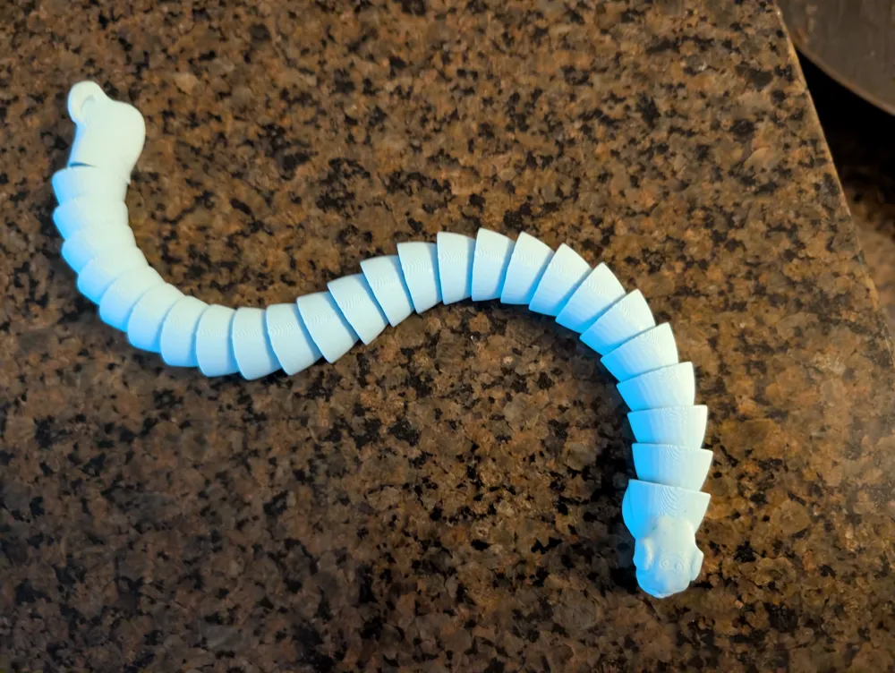 Pug Snake [Print in place] - Free 3D Print Model - MakerWorld