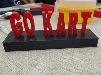 Base con scritta GO KART