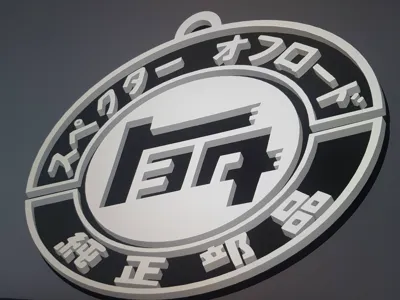 Early Toyota Badge
