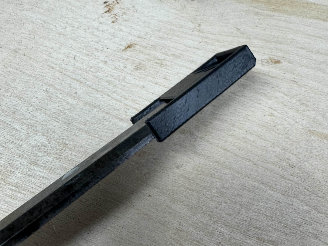 Chisel tip protector with built in supports 