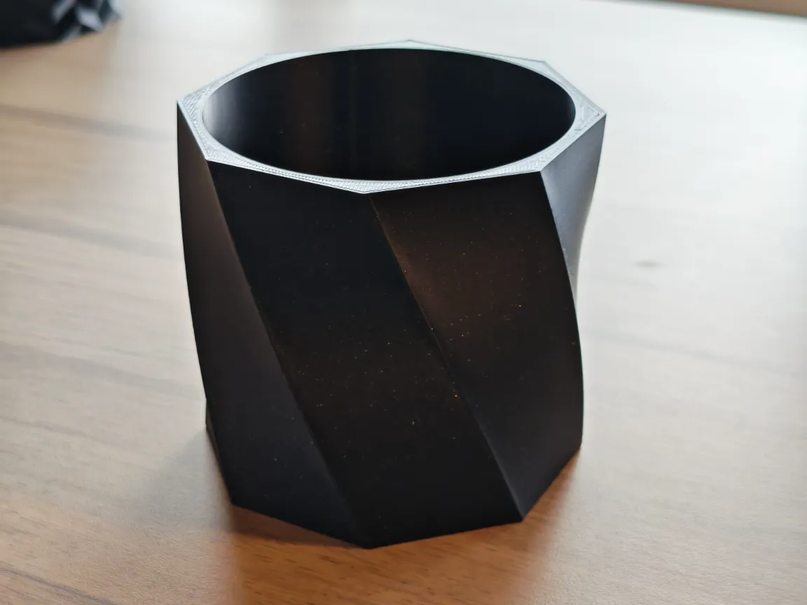 Twisted Low-Poly Planter / Geometric Pot - Free 3D Print Model - MakerWorld