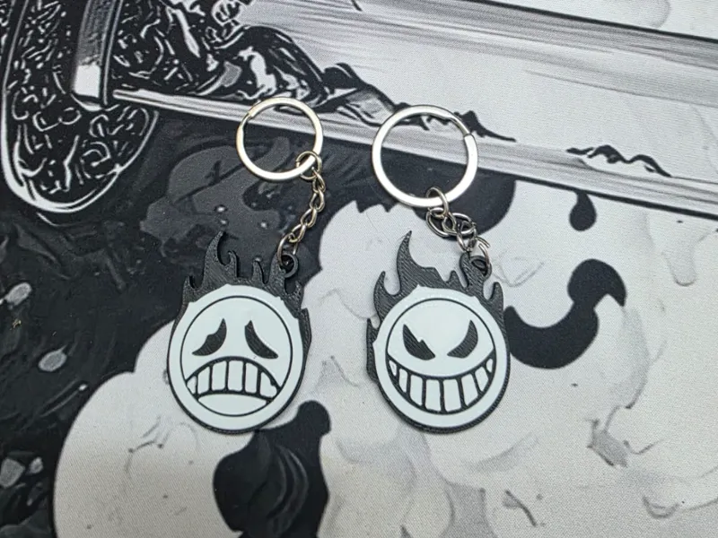 ace sad and happy fasces keychain