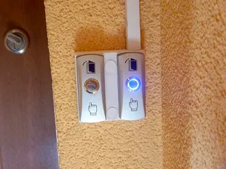 Surface-mounted base for dual gate buttons