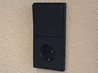 Moderne Steckdose/Wandschalter