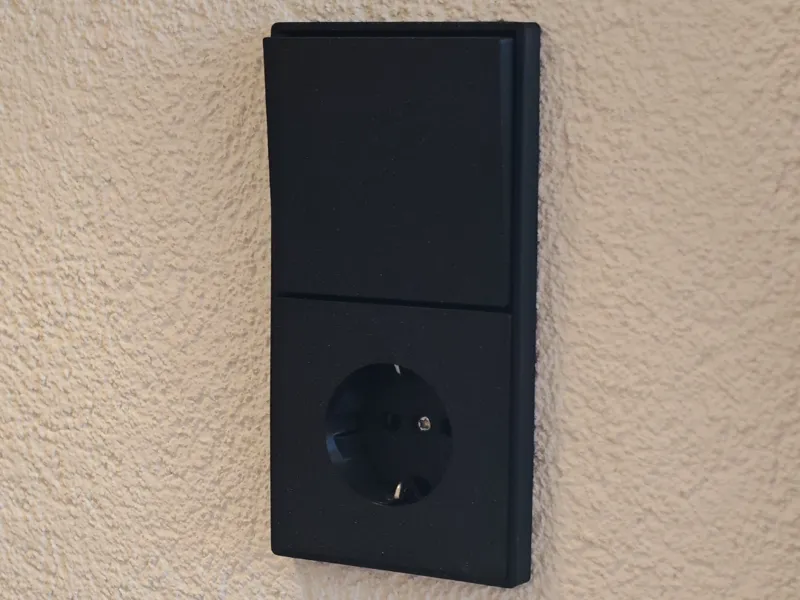 Moderne Steckdose/Wandschalter