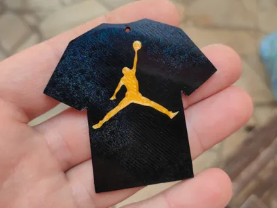 t-shirt shaped keychain with jordan logo