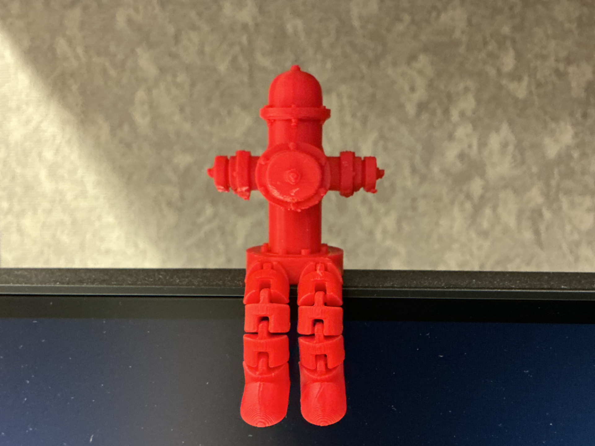 Fire Hydrant Articulated Monitor Sitter Guy