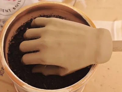 Abstract Simulated Human Hand Garden Rake