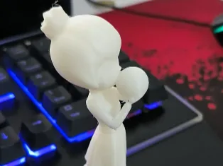 girl blowing up balloons