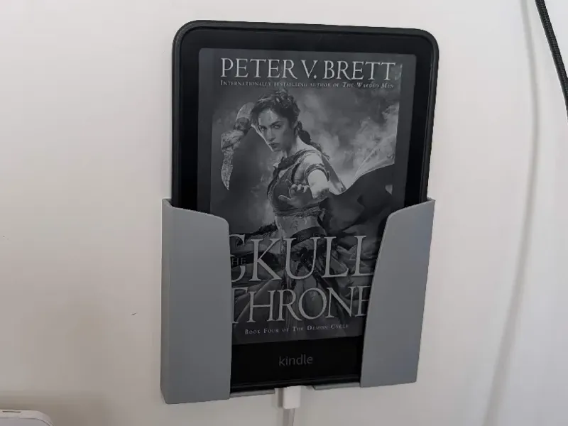 Wall mounted Kindle holder