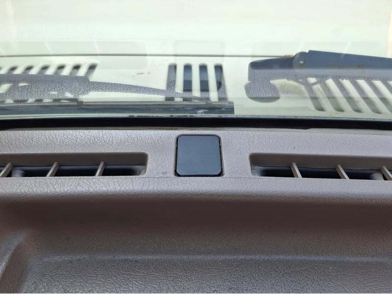 Mazda B2000-B2200 dashboard middle screw cover