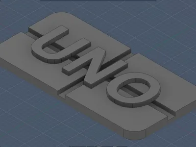 Badge UNO en relief